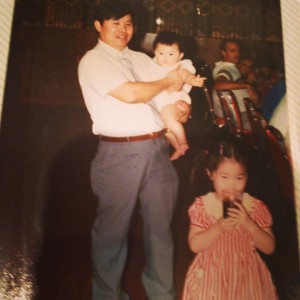 A picture of me as a baby with my dad and my sister Lisa.