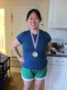 Me with my medal from a 5K I ran/walked in 2011. 