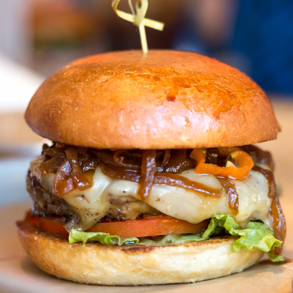 Ryan ordered the El Diablo: Angus Beef, Pepper Jack, Habaneros, Serranos, Caramelized Onions, Salsa Roja, Chipotle Mayo. Photo taken by Ryan Kane.