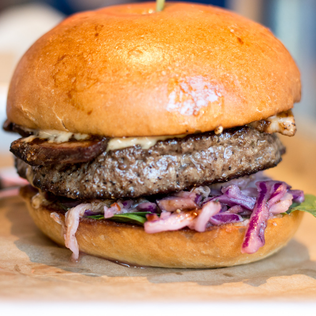 K-Town Belly: Grass-Fed Beef, Braised Beeler's Pure Pork Belly, Kimchi, House-made Gochujang, Korean Rice Crispies, Mayo, Basil Leaves. Photo taken by Ryan Kane.