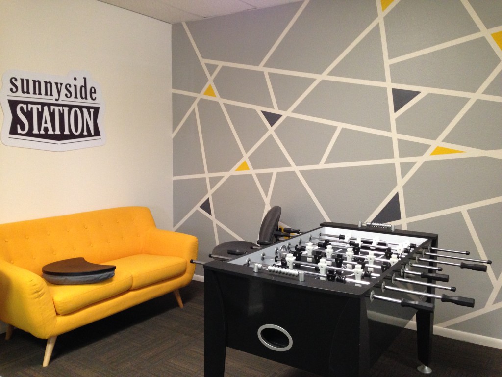 Sunnyside Station's front lounge area, complete with foosball.