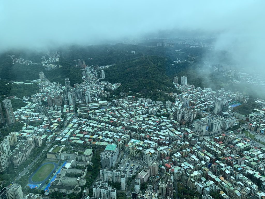 Clouds float above the Taipei cityscape as viewed from the Taipei 101 Observatory.