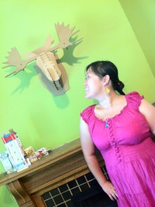 Admiring the cardboard moose at Creative Density in the summer of 2012.