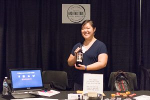 We recently hosted a vendor booth at the Denver Metro Chamber of Commerce's Net90 Marketplace. Here I am with our giveaway prizes.